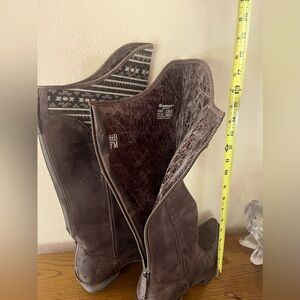 over the knee area stylish party boots. Can be worn at the barn if you choose